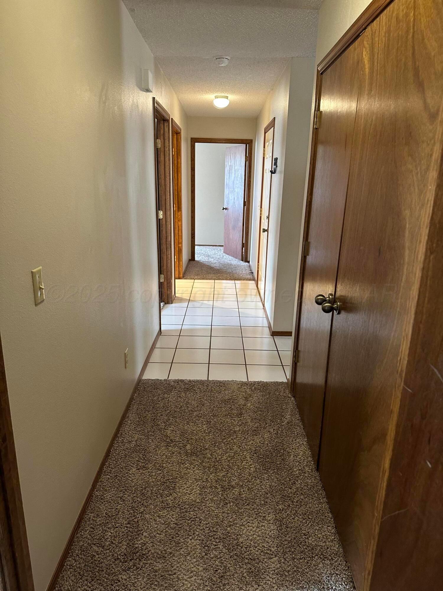 901 7th Street Canyon, TX 79015 - Photo 9 of 9 a view of entryway with a hallway