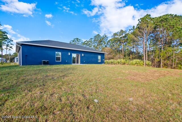 Undisclosed Address Palm Bay, FL 32909 - Photo 20 of 21 a view of house with yard