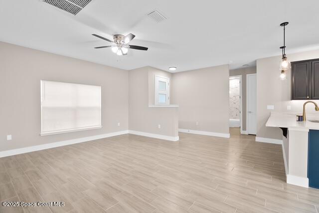 Undisclosed Address Palm Bay, FL 32909 - Photo 4 of 21 a view of an empty room with a window and wooden floor