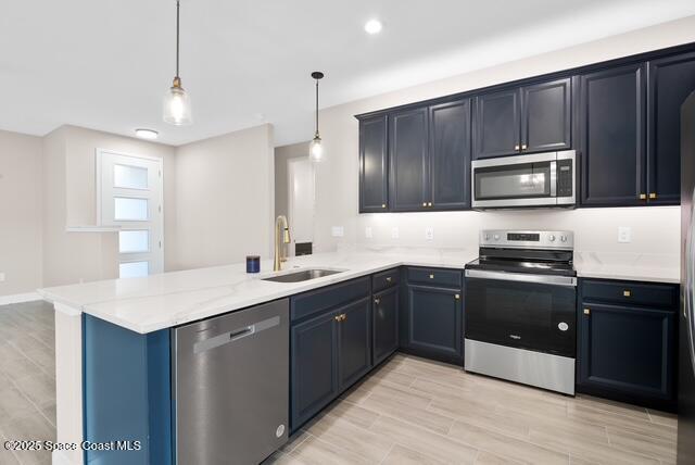 Undisclosed Address Palm Bay, FL 32909 - Photo 9 of 21 a kitchen with a sink a stove and microwave