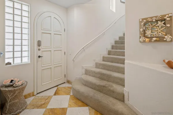 a view of staircase with white walls and white walls