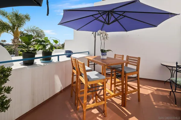 a view of an outdoor space with furniture