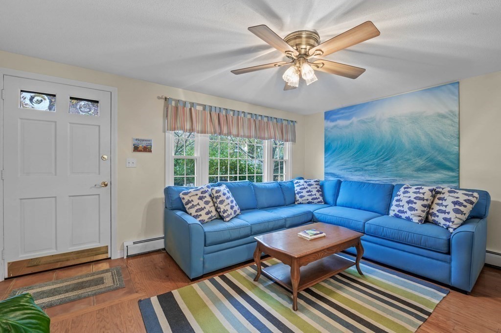 27 Norwood Avenue, Unit 2 Manchester, MA 01944 - Photo 3 of 17 a living room with furniture and a large window