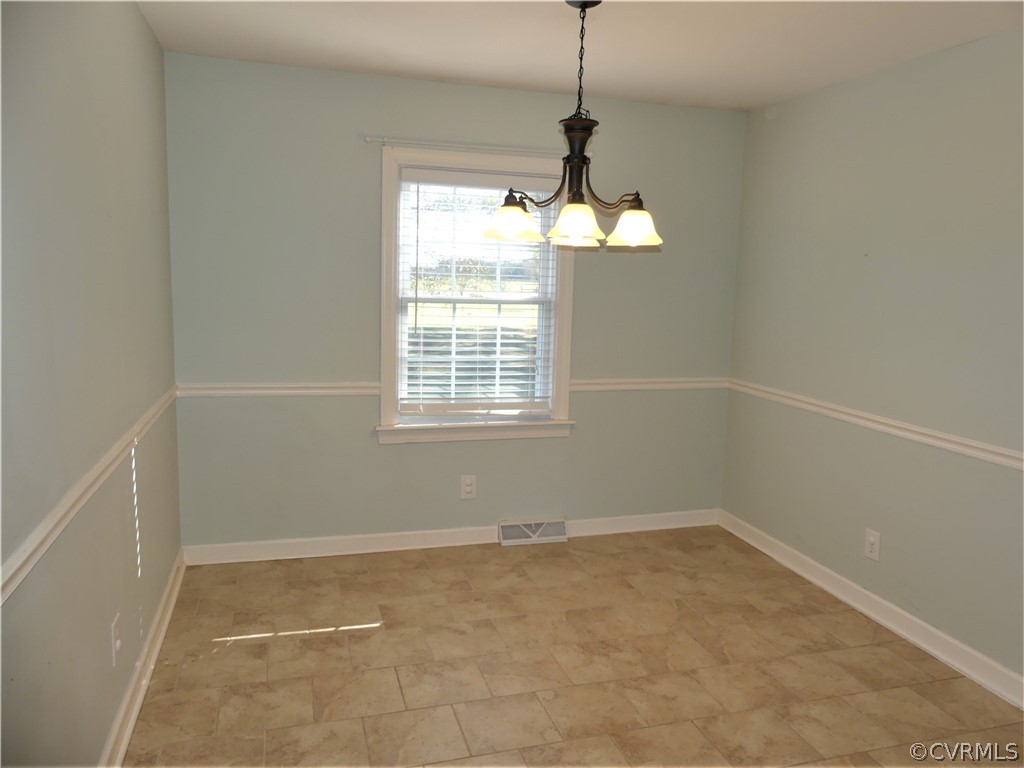 1325 Courthouse Road Chase City, VA 23924 - Photo 16 of 49 a view of an empty room with a window