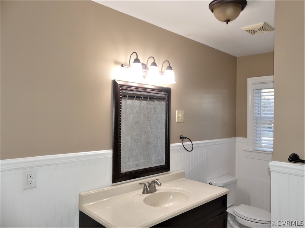 1325 Courthouse Road Chase City, VA 23924 - Photo 32 of 49 a bathroom with a sink and a toilet