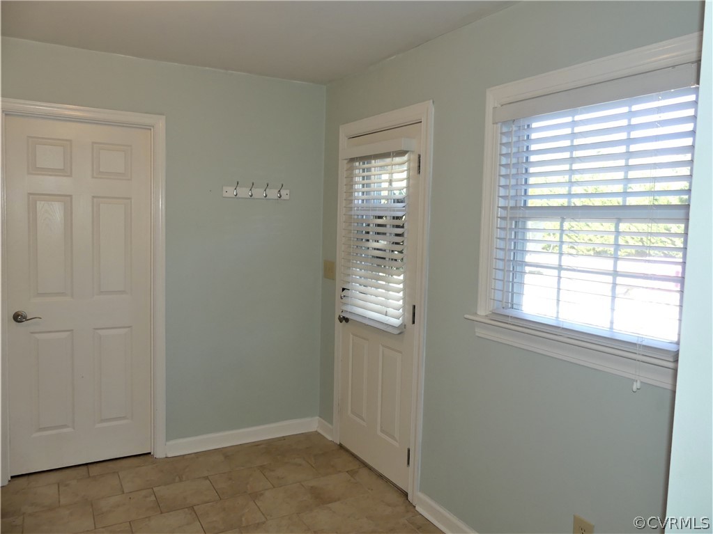1325 Courthouse Road Chase City, VA 23924 - Photo 36 of 49 an empty room with windows