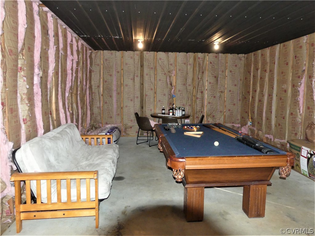 1325 Courthouse Road Chase City, VA 23924 - Photo 44 of 49 a room with furniture and a chandelier