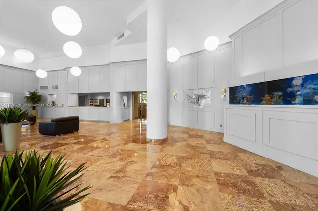 a view of a balcony with potted plants