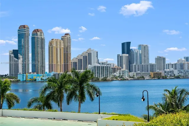 a view of a city with tall buildings