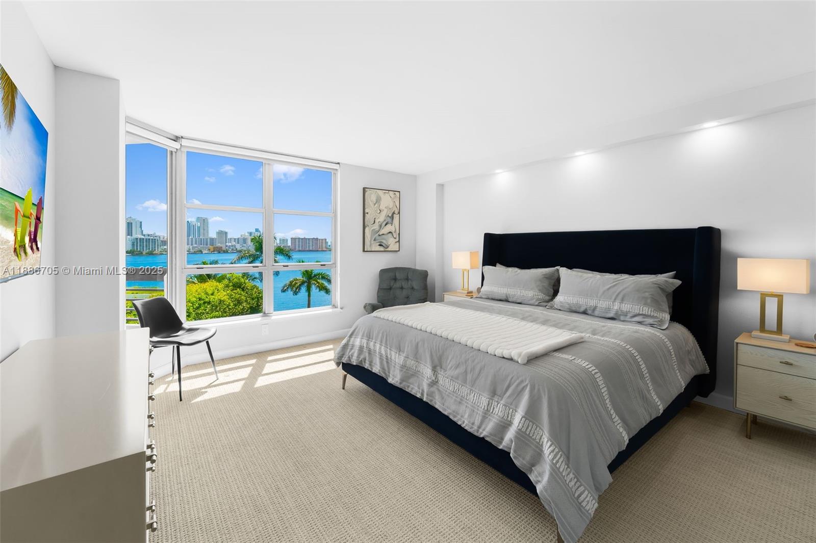 3600 Mystic Pointe Drive, Unit 614 Aventura, FL 33180 - Photo 7 of 14 a bedroom with a bed and a couch