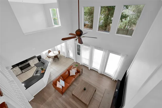a view of living room with furniture and a window
