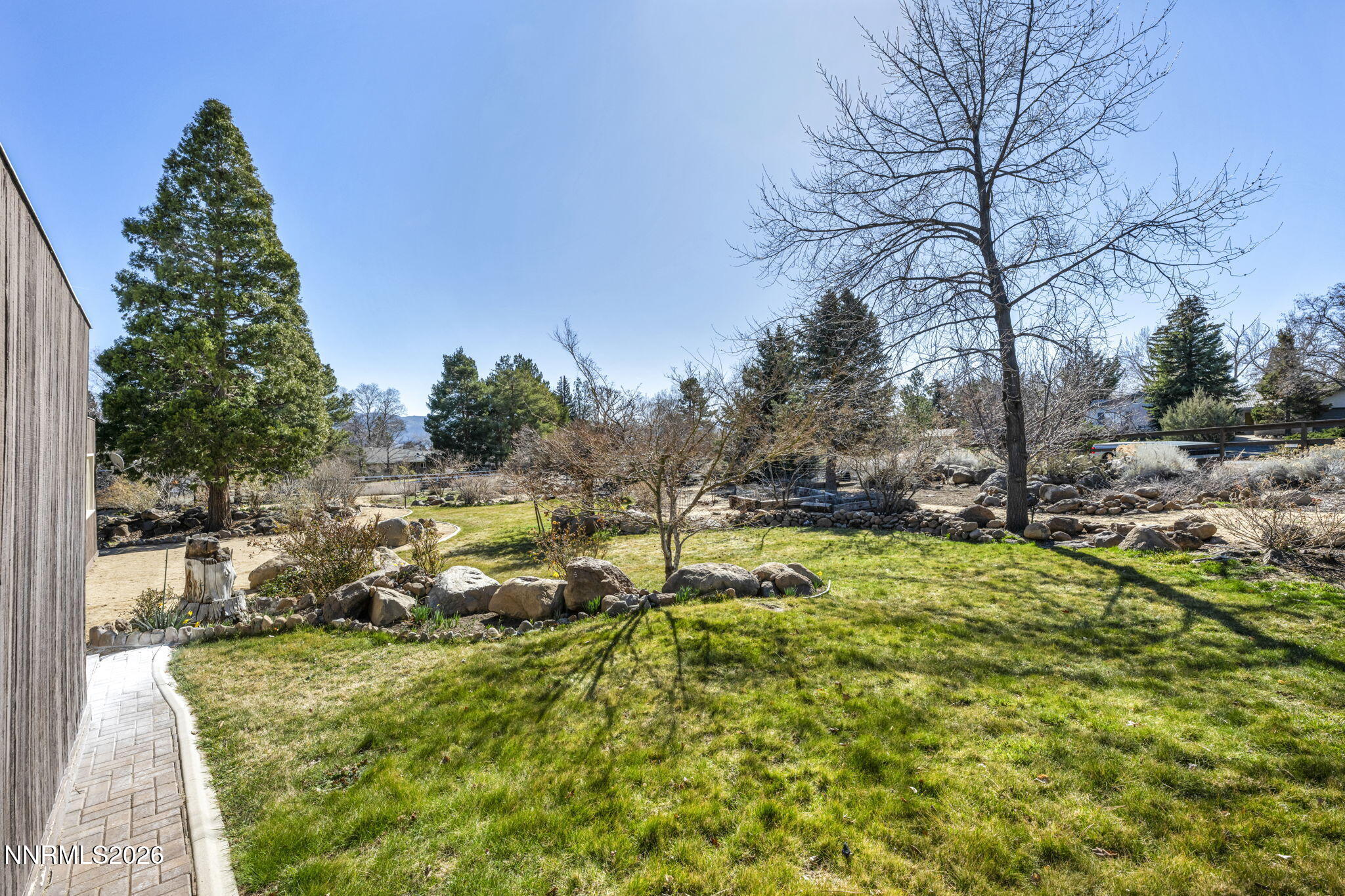 13600 Stoneybrook Drive Reno, NV 89511 - Photo 13 of 120 a view of a yard with large trees