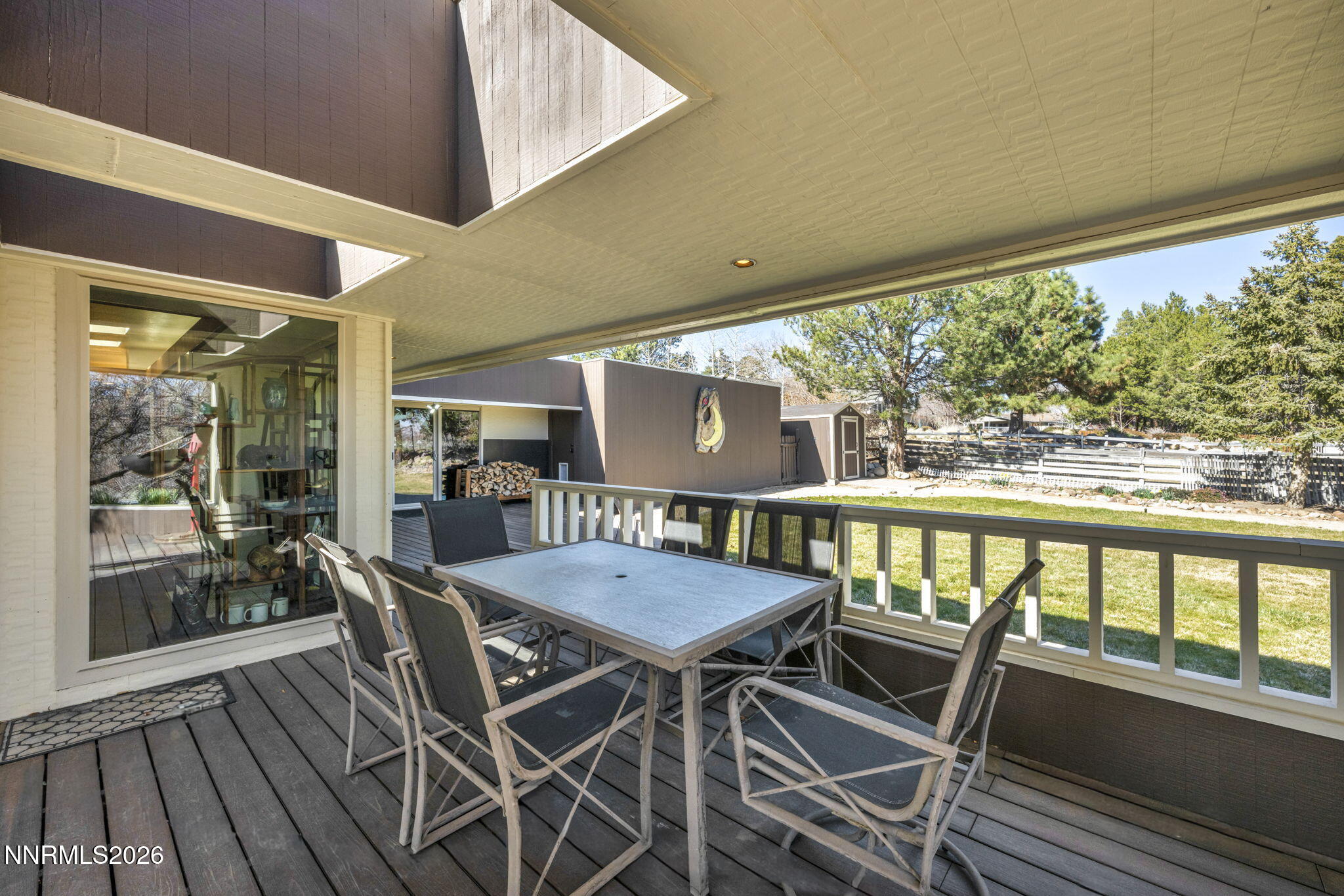 13600 Stoneybrook Drive Reno, NV 89511 - Photo 27 of 120 a view of a dining room with furniture window and wooden floor