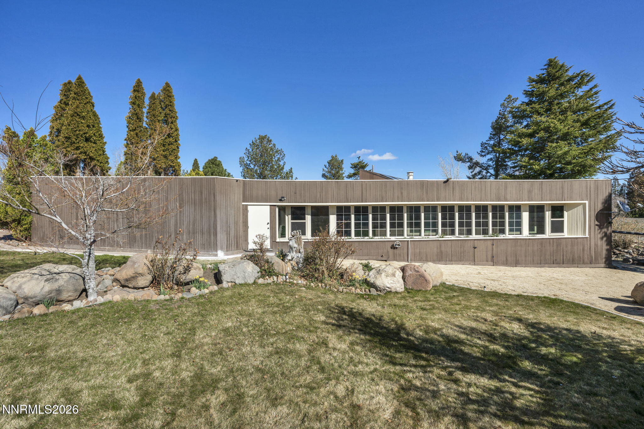 13600 Stoneybrook Drive Reno, NV 89511 - Photo 32 of 120 a view of a house with a yard