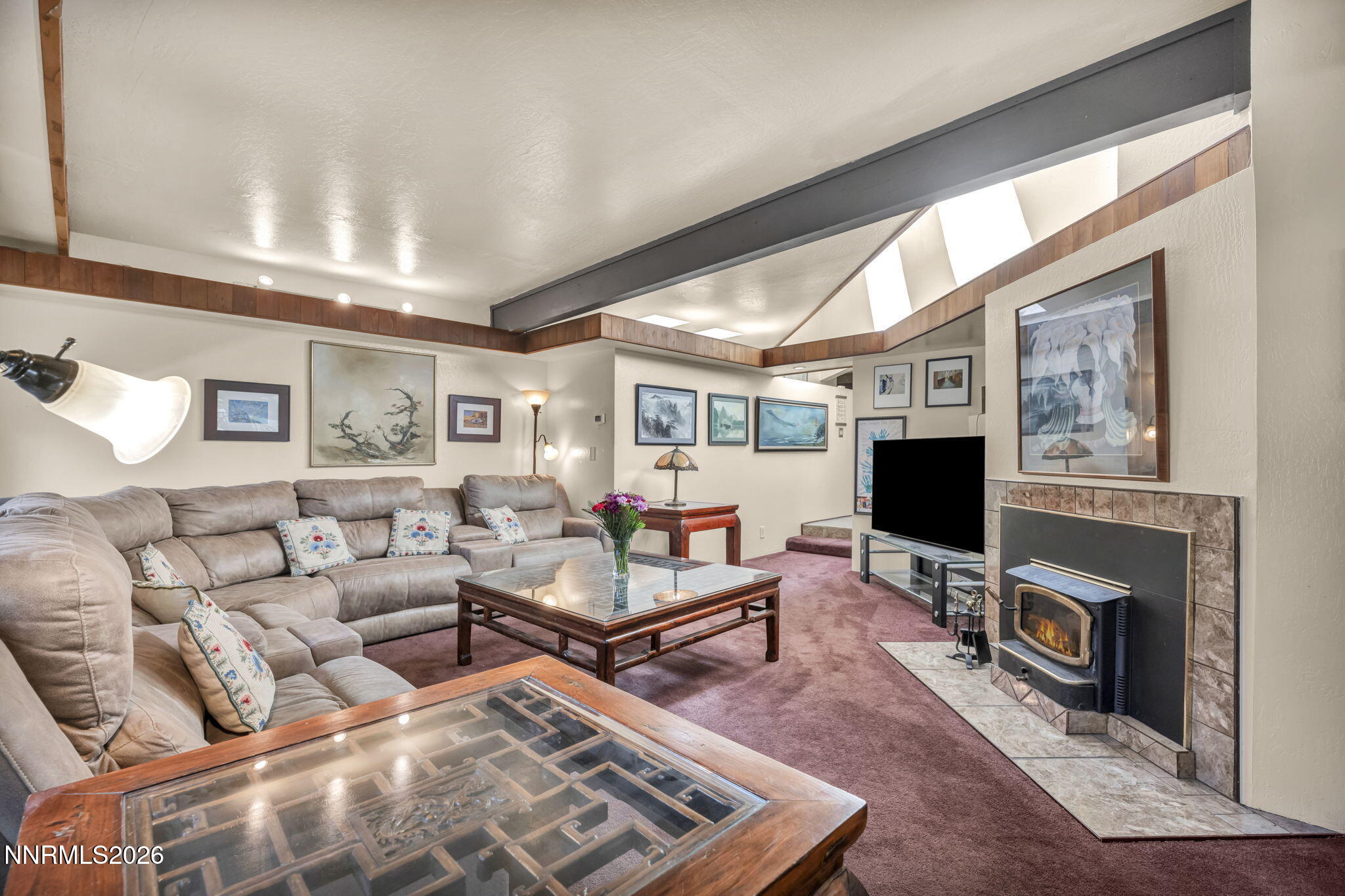 13600 Stoneybrook Drive Reno, NV 89511 - Photo 70 of 120 a living room with furniture and a flat screen tv