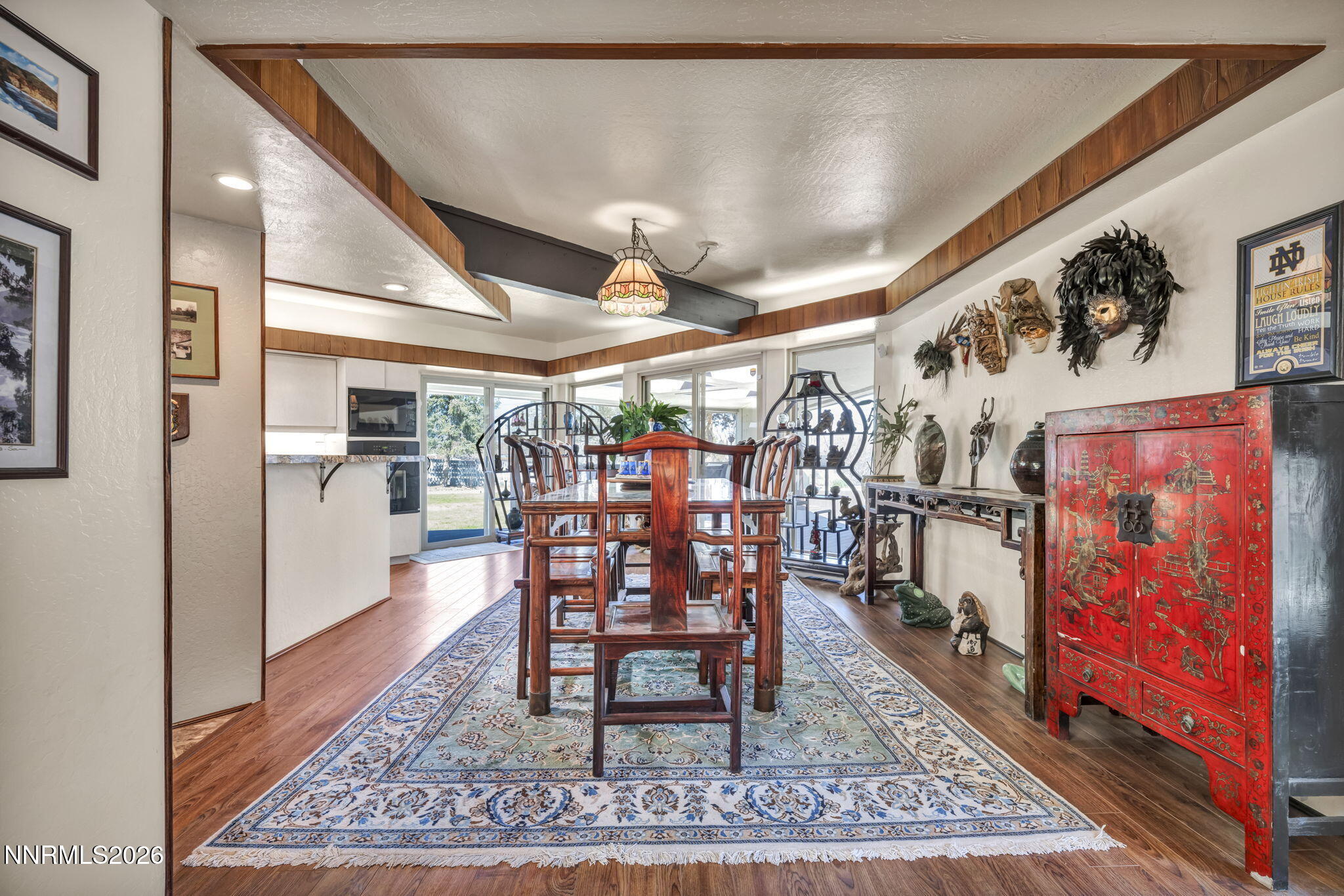 13600 Stoneybrook Drive Reno, NV 89511 - Photo 79 of 120 a room with lots of wooden furniture and a rug