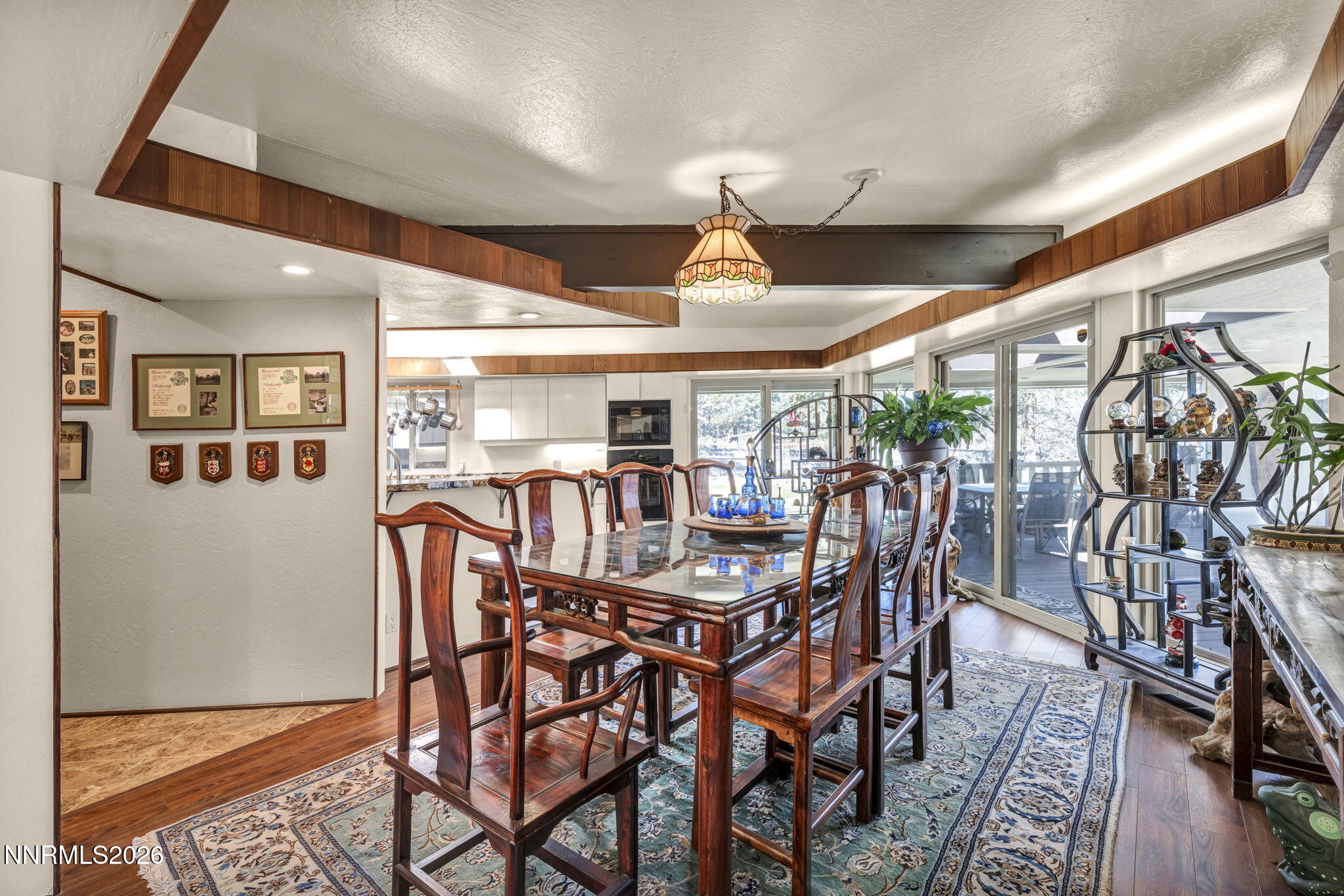 13600 Stoneybrook Drive Reno, NV 89511 - Photo 82 of 120 a view of a dining room with furniture window and wooden floor