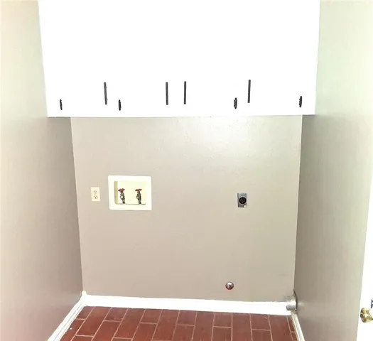 a view of a refrigerator in kitchen