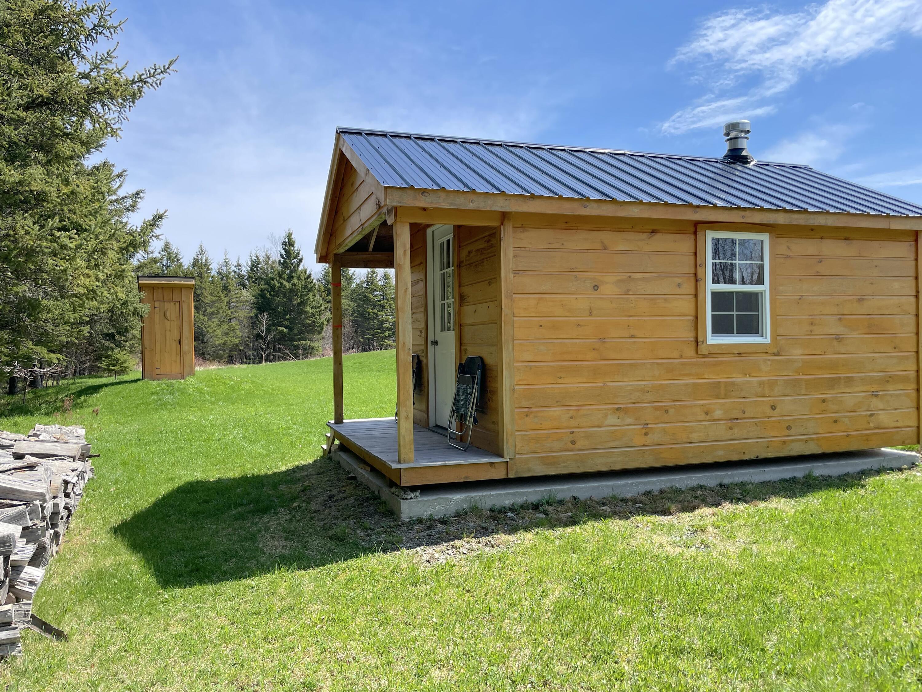 1755 Woodland Center Road Perham, ME 04766 - Photo 15 of 20 Bunkhouse and Privy