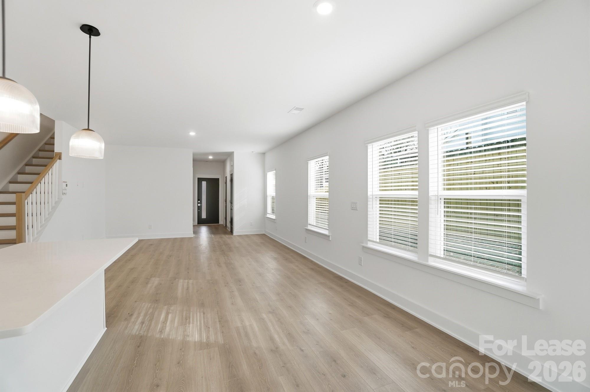 3941 Tillman Road Charlotte, NC 28208 - Photo 14 of 48 a view of an empty room with a window