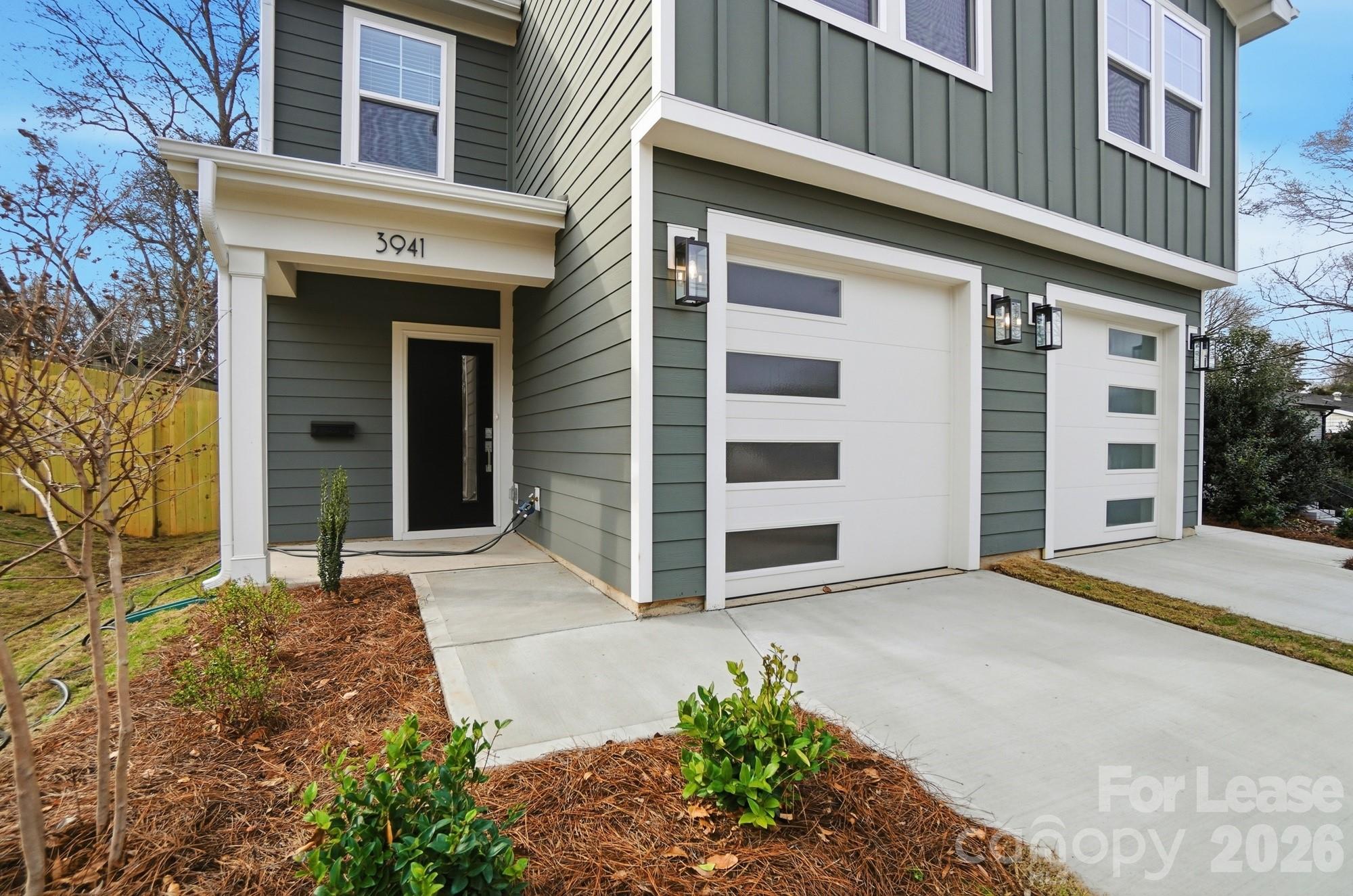 3941 Tillman Road Charlotte, NC 28208 - Photo 2 of 48 a view of a house with a yard