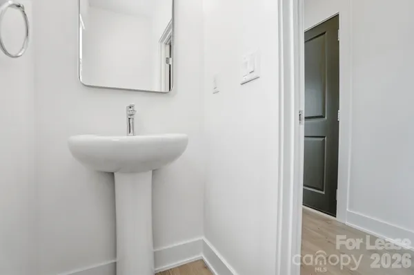 a view of entryway with wooden floor