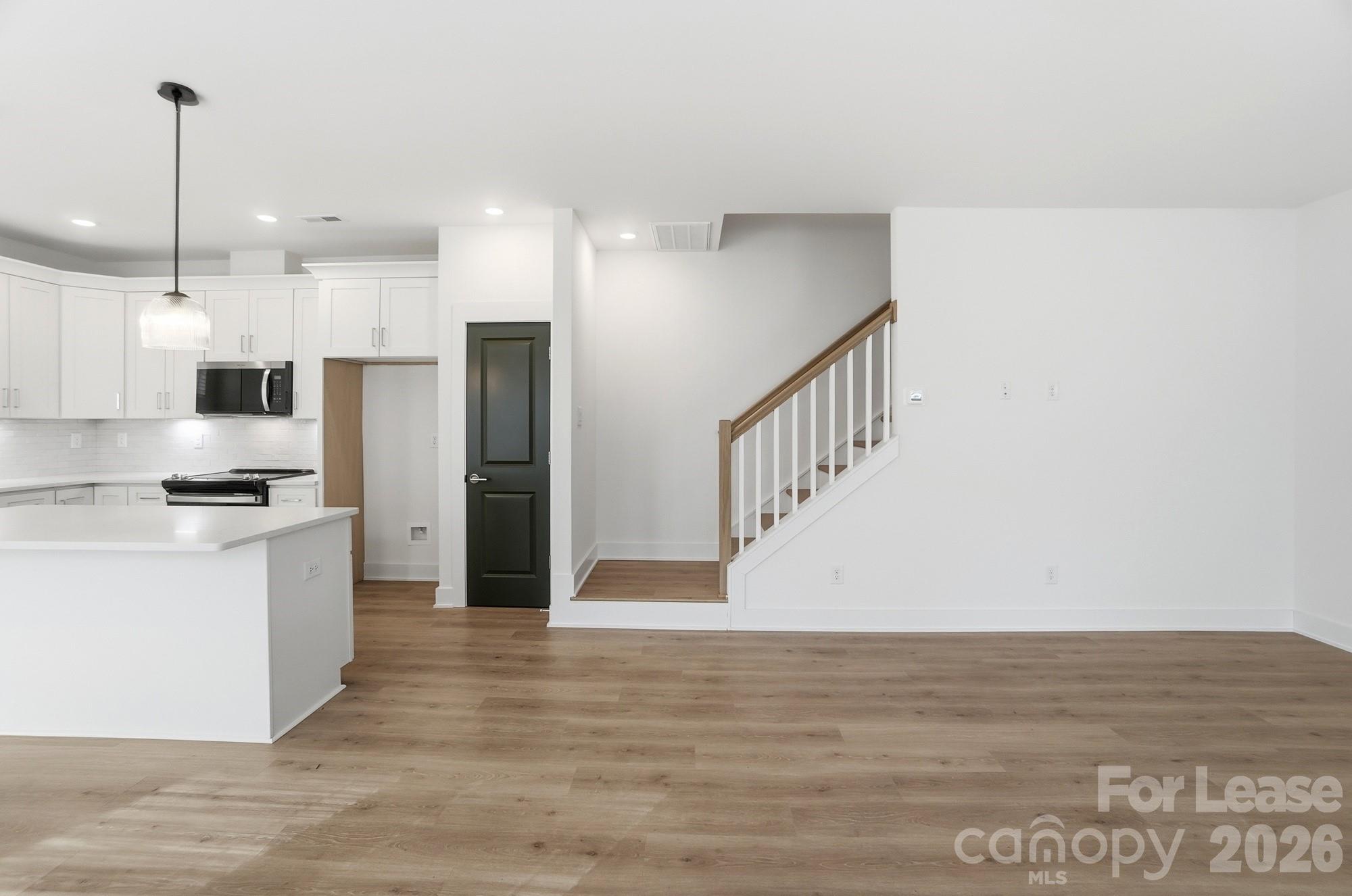 3941 Tillman Road Charlotte, NC 28208 - Photo 23 of 48 a view of kitchen with wooden floor