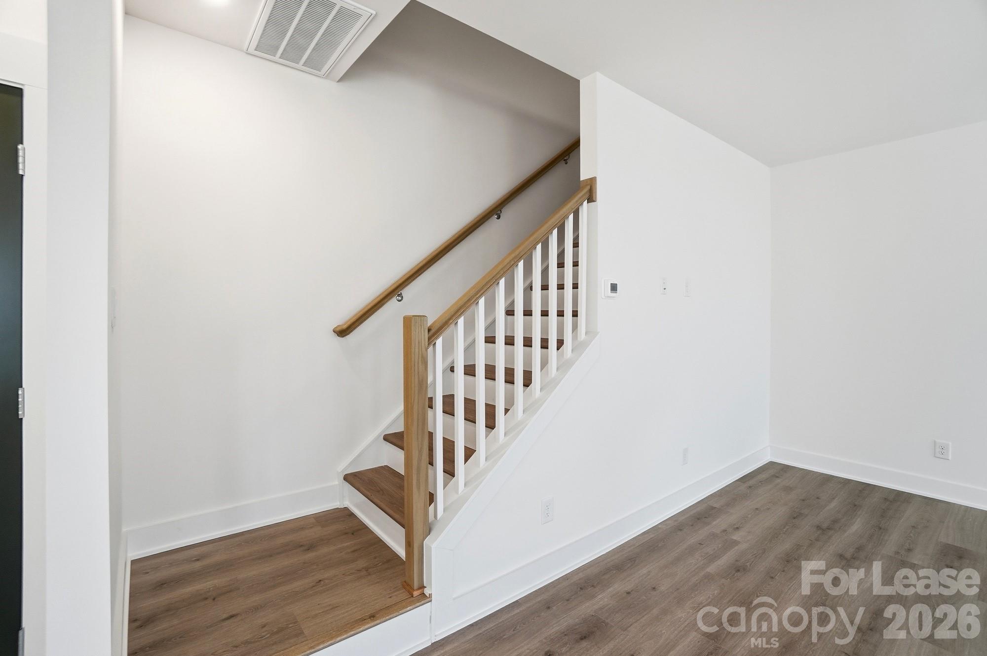 3941 Tillman Road Charlotte, NC 28208 - Photo 24 of 48 a view of entryway with wooden floor