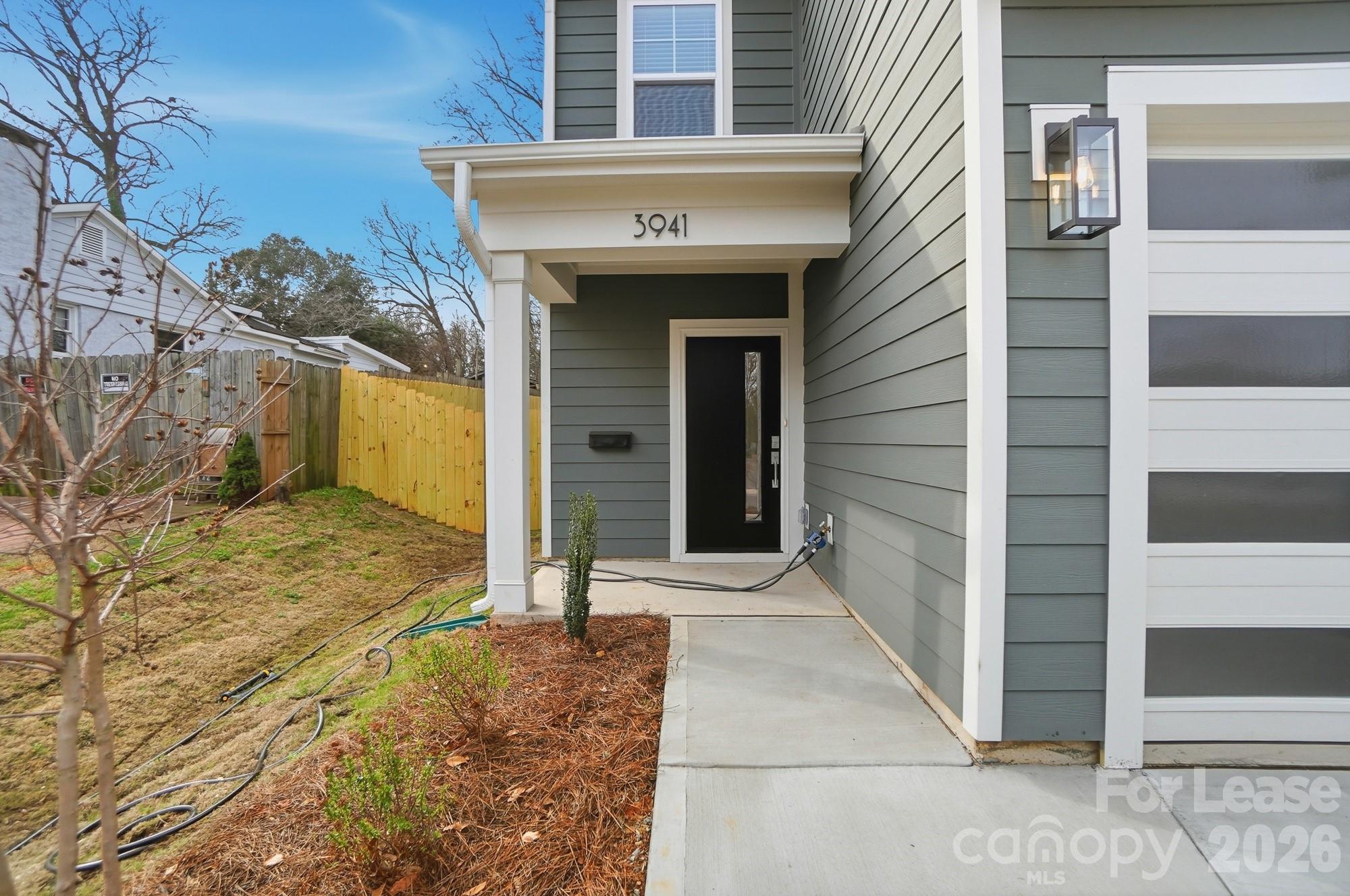 3941 Tillman Road Charlotte, NC 28208 - Photo 3 of 48 a view of entrance of the house