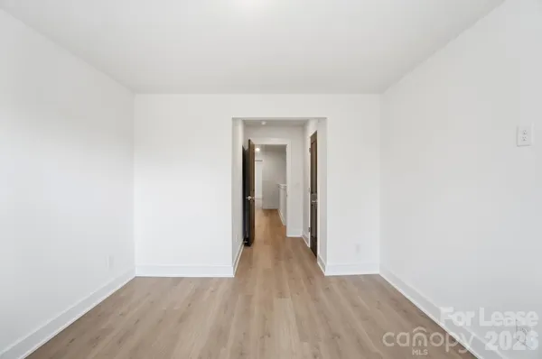a bathroom with a sink toilet and mirror