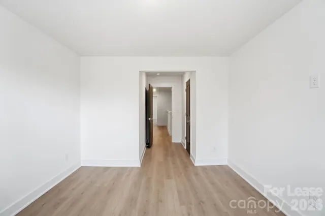 a bathroom with a sink toilet and mirror