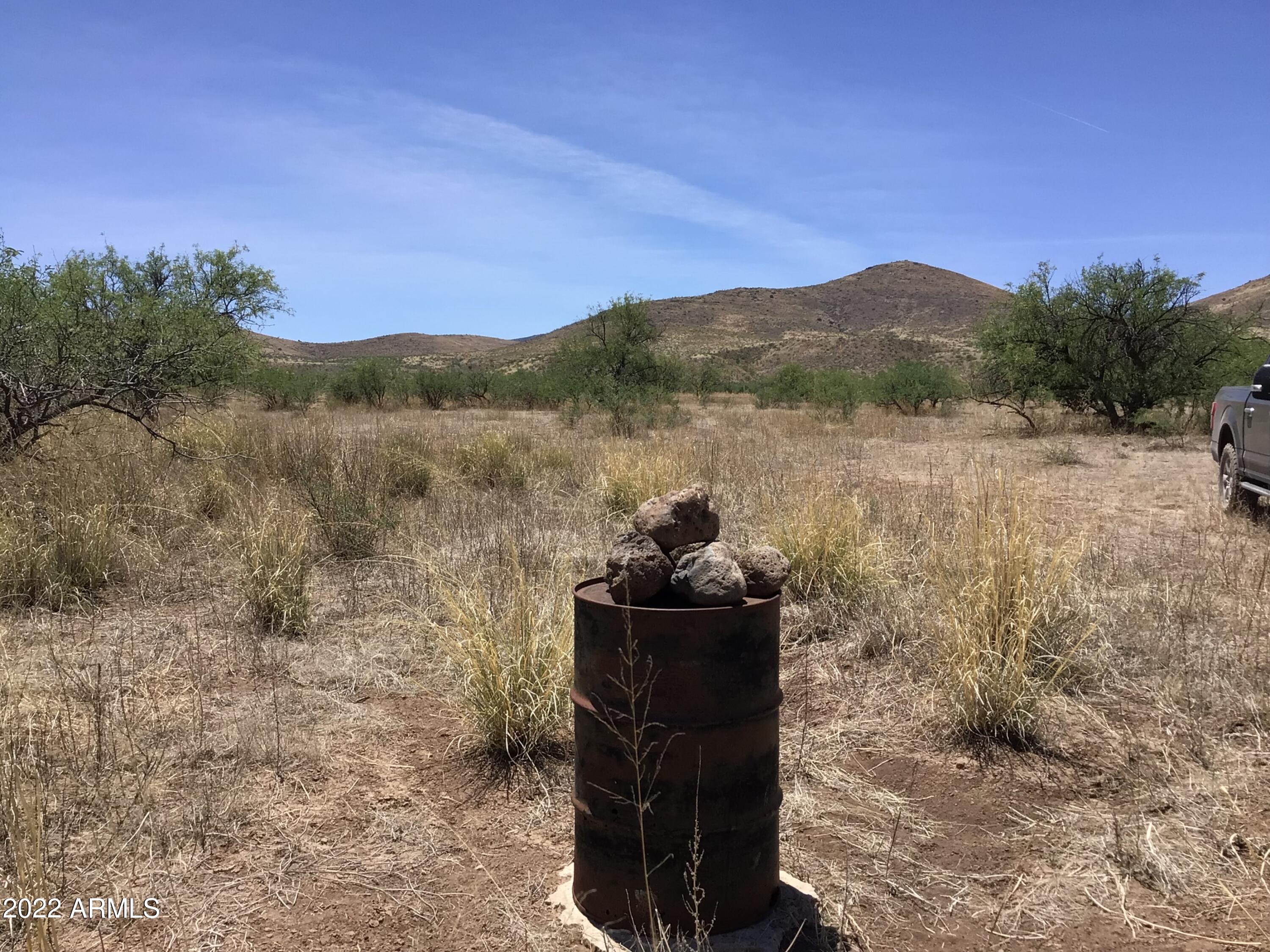 44.23-ac West Grey Bear Road, Unit 101 Willcox, AZ 85643 - Photo 13 of 21 a view of a lake with a mountain in the background