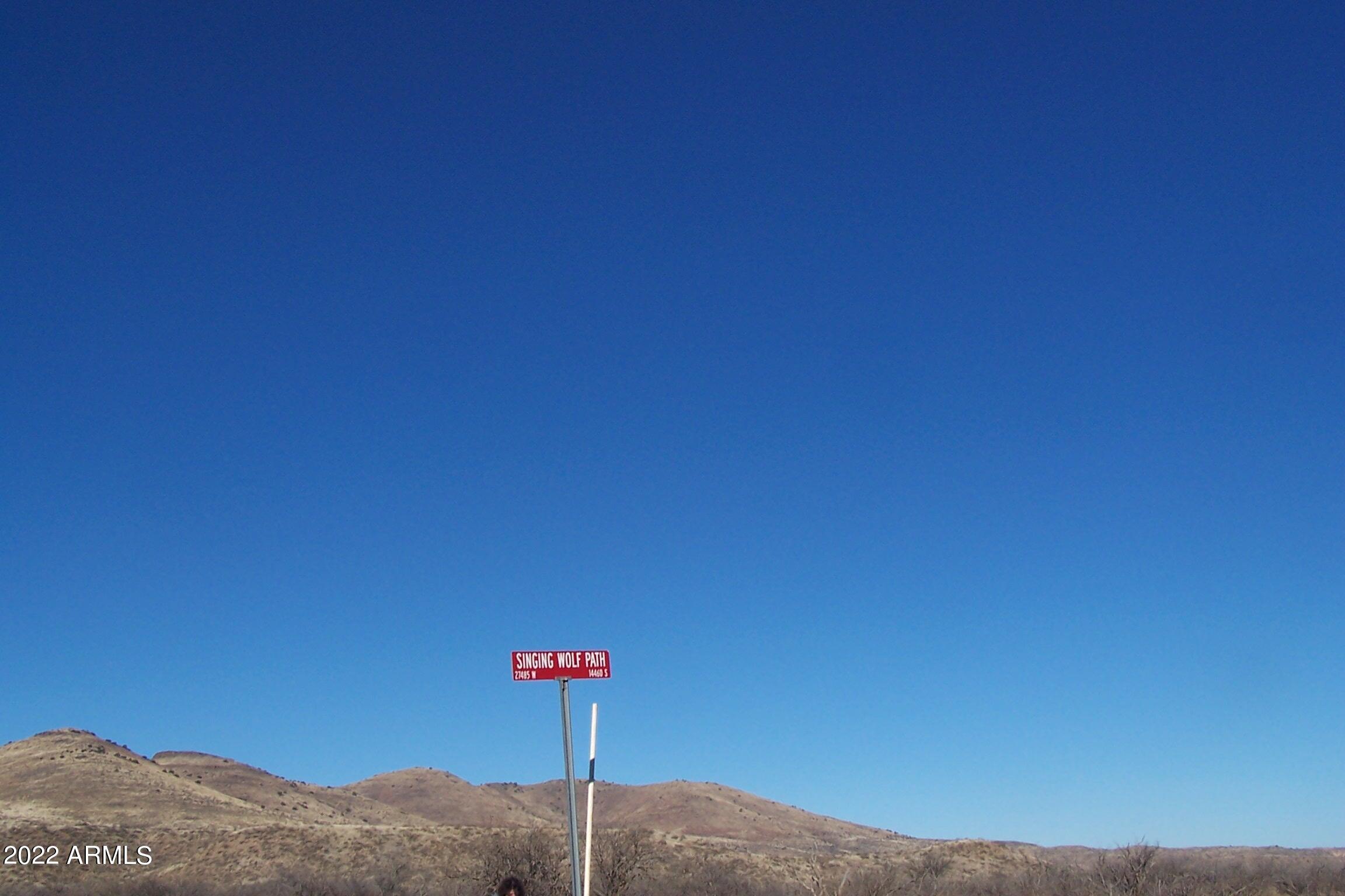 44.23-ac West Grey Bear Road, Unit 101 Willcox, AZ 85643 - Photo 20 of 21 a sign that is sitting on a field