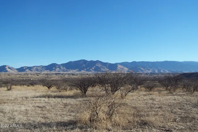 a view of a lake with mountains in the background