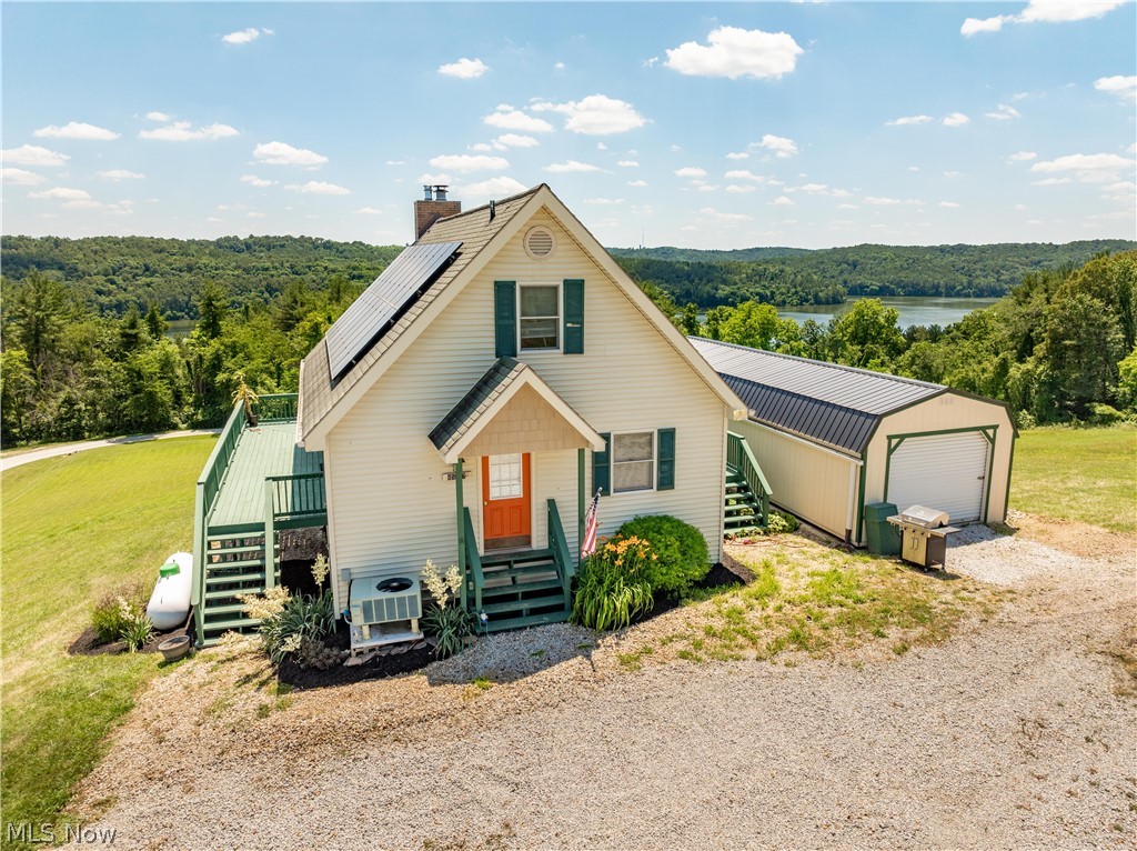 85547 Beagle Clb Road Scio, OH 43988 - Photo 2 of 38 Front Of Home with Garage and views
