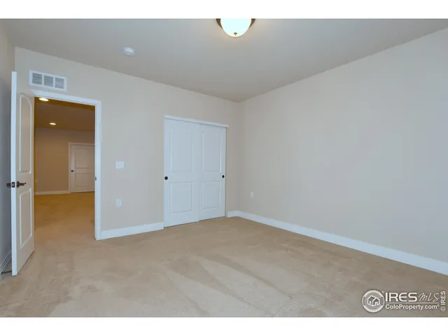 a view of a livingroom with gym equipment