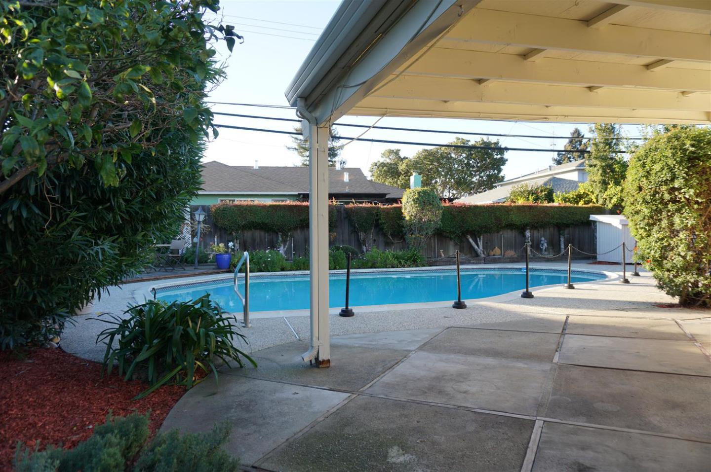 580 Pomeroy Avenue Santa Clara, CA 95051 - Photo 2 of 15 a view of a child park