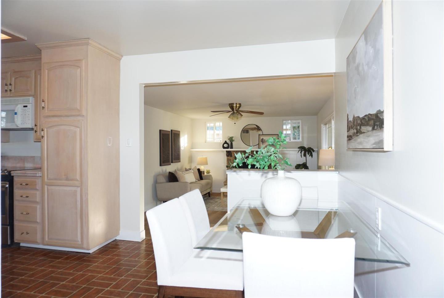 580 Pomeroy Avenue Santa Clara, CA 95051 - Photo 6 of 15 a living room with furniture and a potted plant