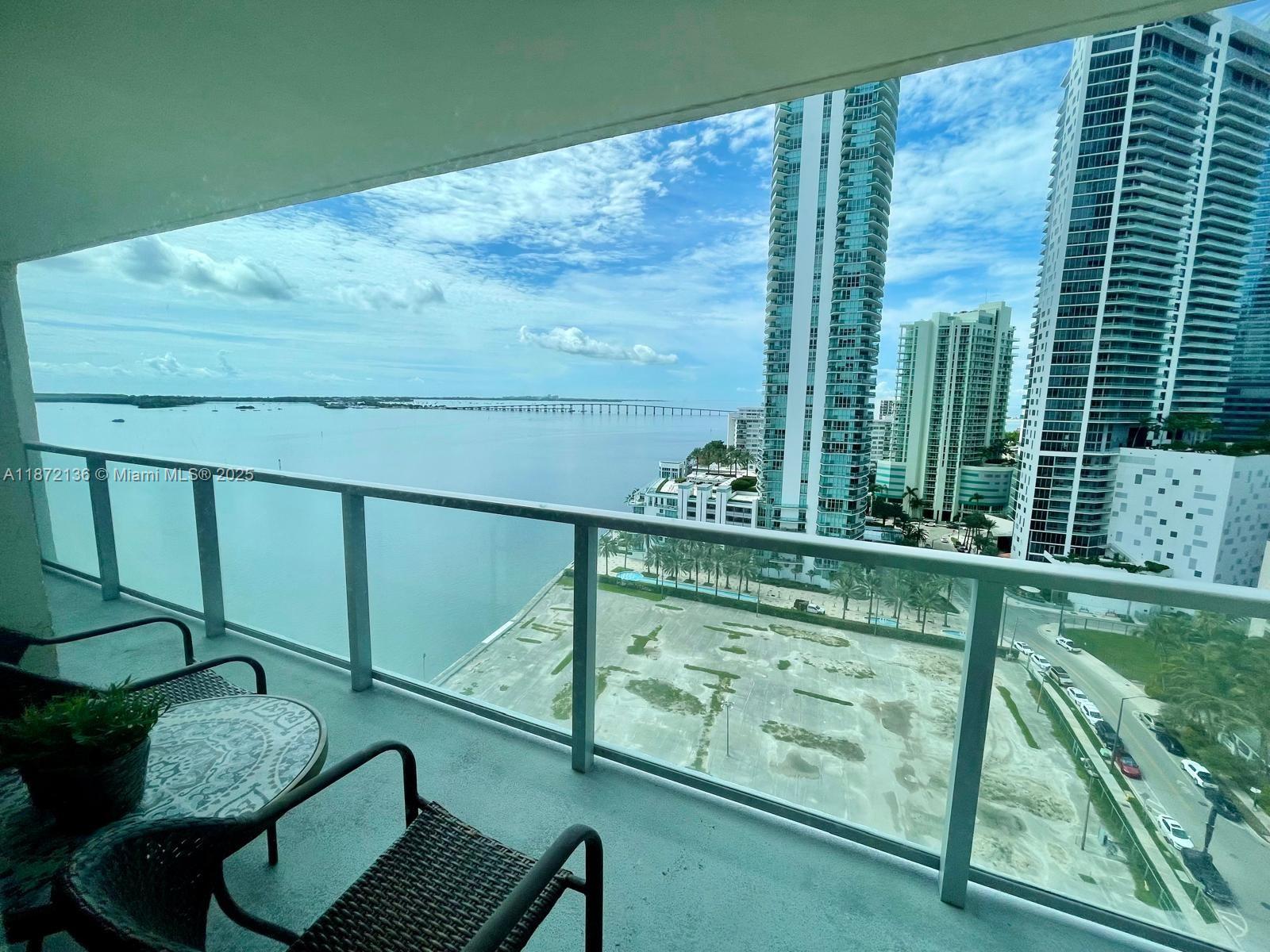 1155 Brickell Bay Drive, Unit 1805 Miami, FL 33131 - Photo 1 of 11 a view of sitting area in kitchen