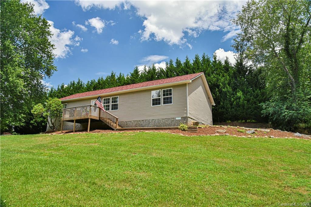 90 Devlin Street Canton, NC 28716 - Photo 24 of 25 a view of a house with a yard