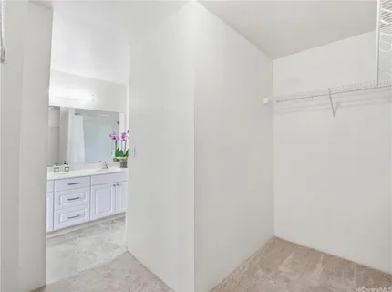 a view of cabinets and wooden floor