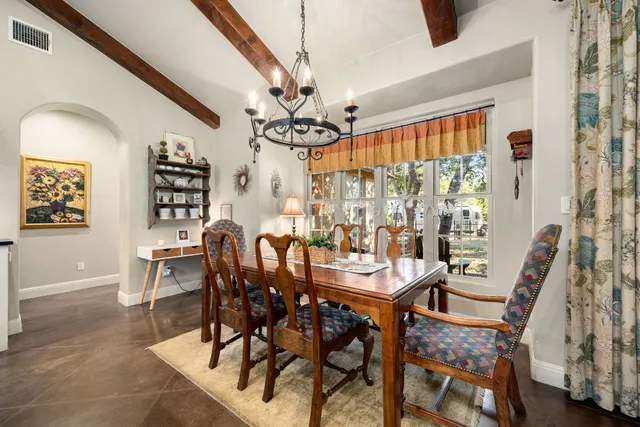a kitchen with stainless steel appliances granite countertop a stove and a sink