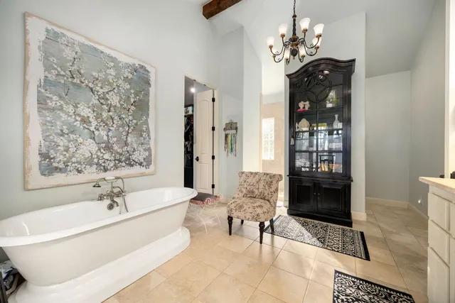 a front view of a house with a yard and a garage