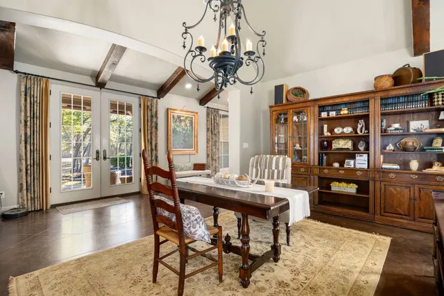 a large kitchen with stainless steel appliances lots of counter space and a large window