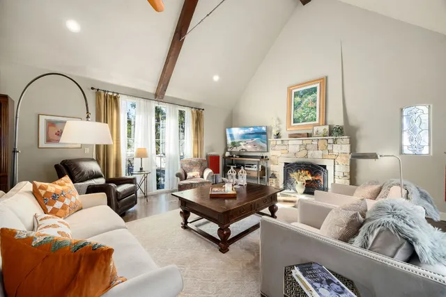 a kitchen with stainless steel appliances granite countertop a stove and cabinets