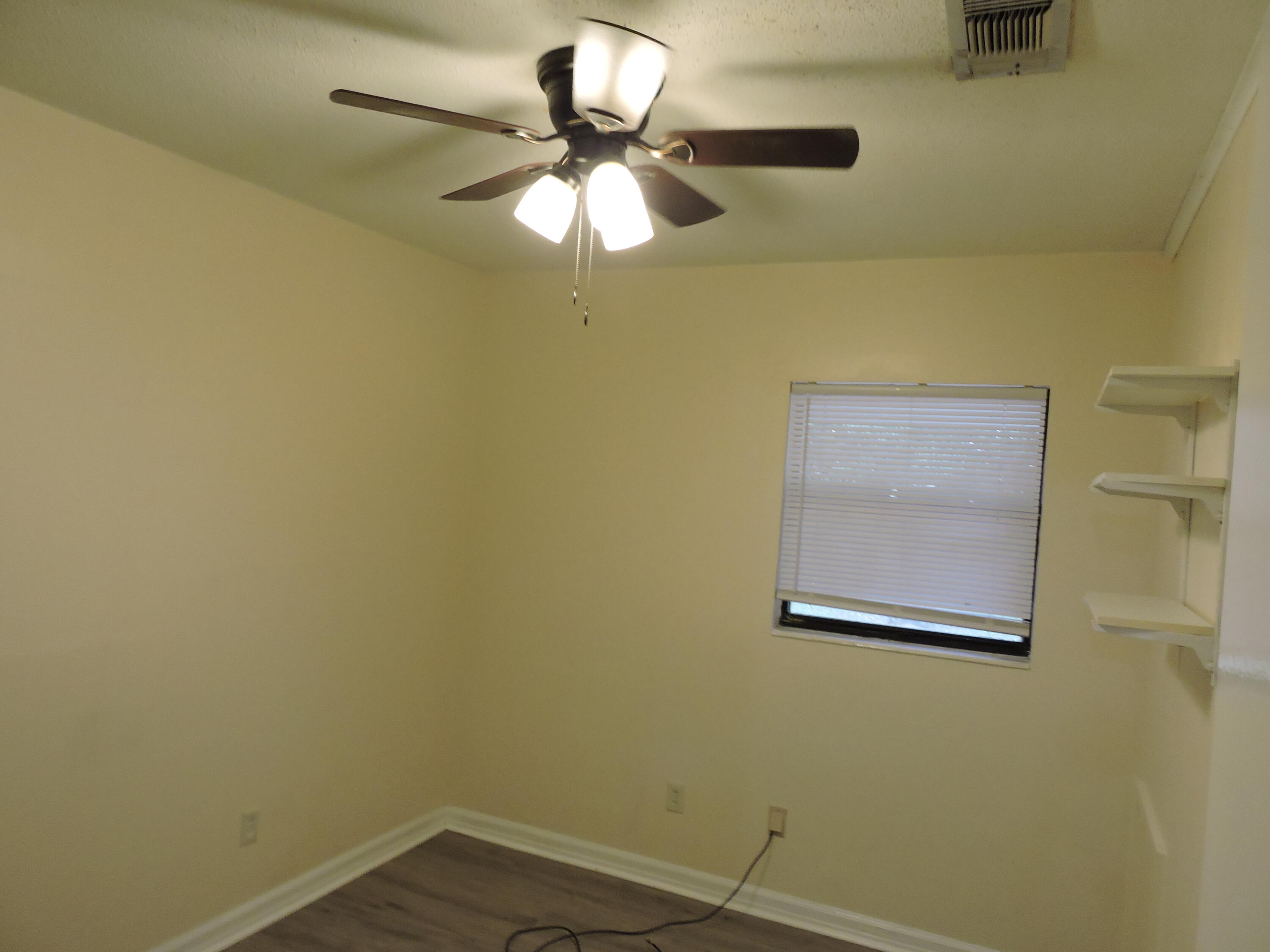 120 Sikes Drive Crestview, FL 32539 - Photo 10 of 18 a view of a small space with a fan