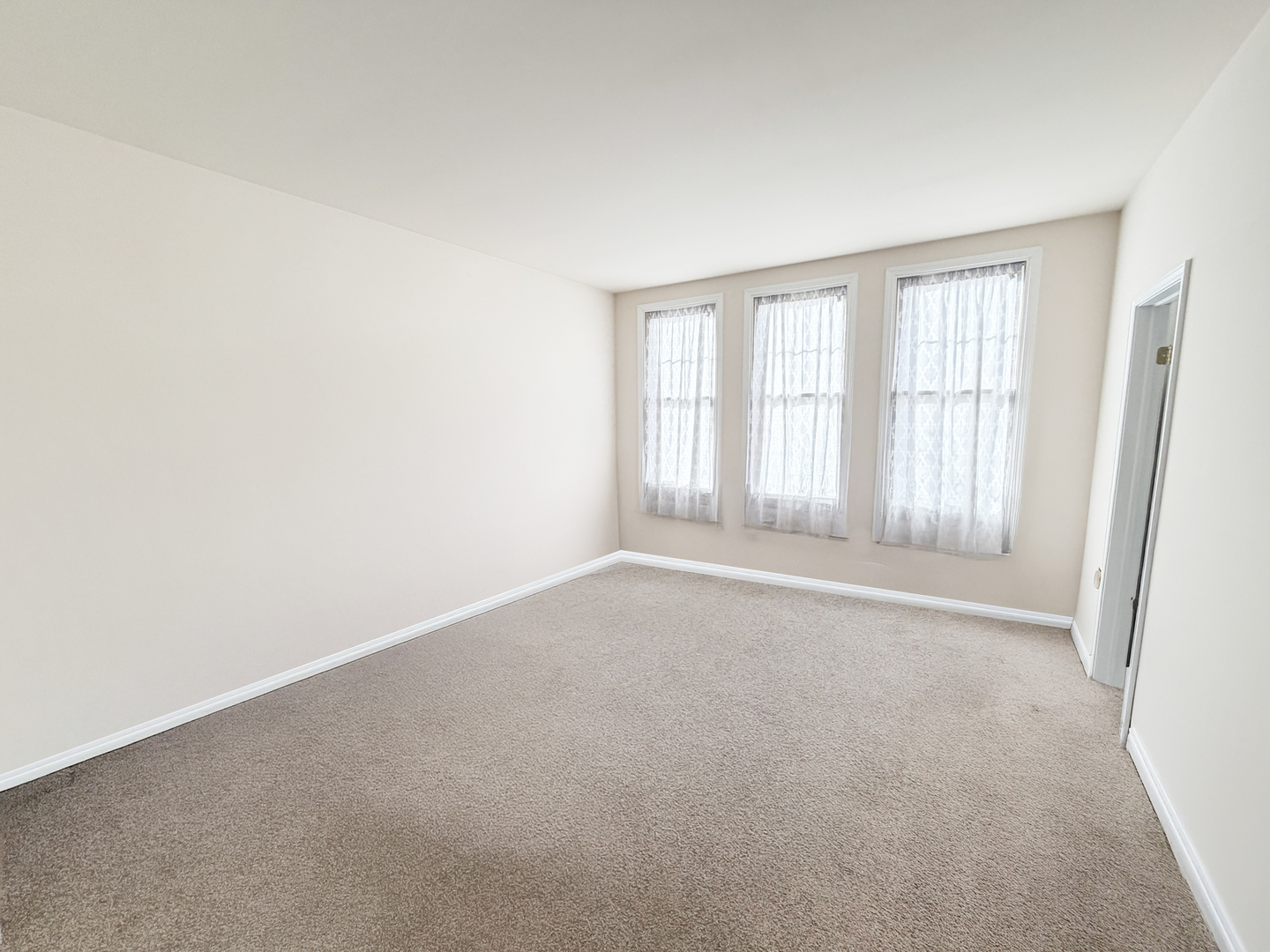 Undisclosed Address Elgin, IL 60120 - Photo 18 of 22 an empty room with windows
