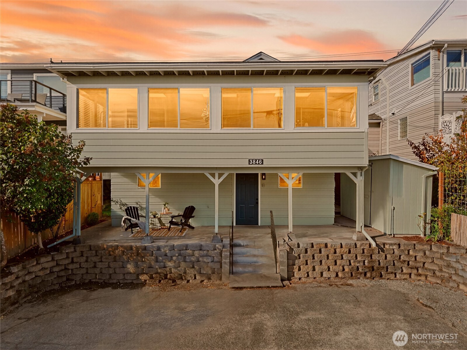 3846 35th Avenue Southwest Seattle, WA 98126 - Photo 1 of 40 front view of a house with a patio