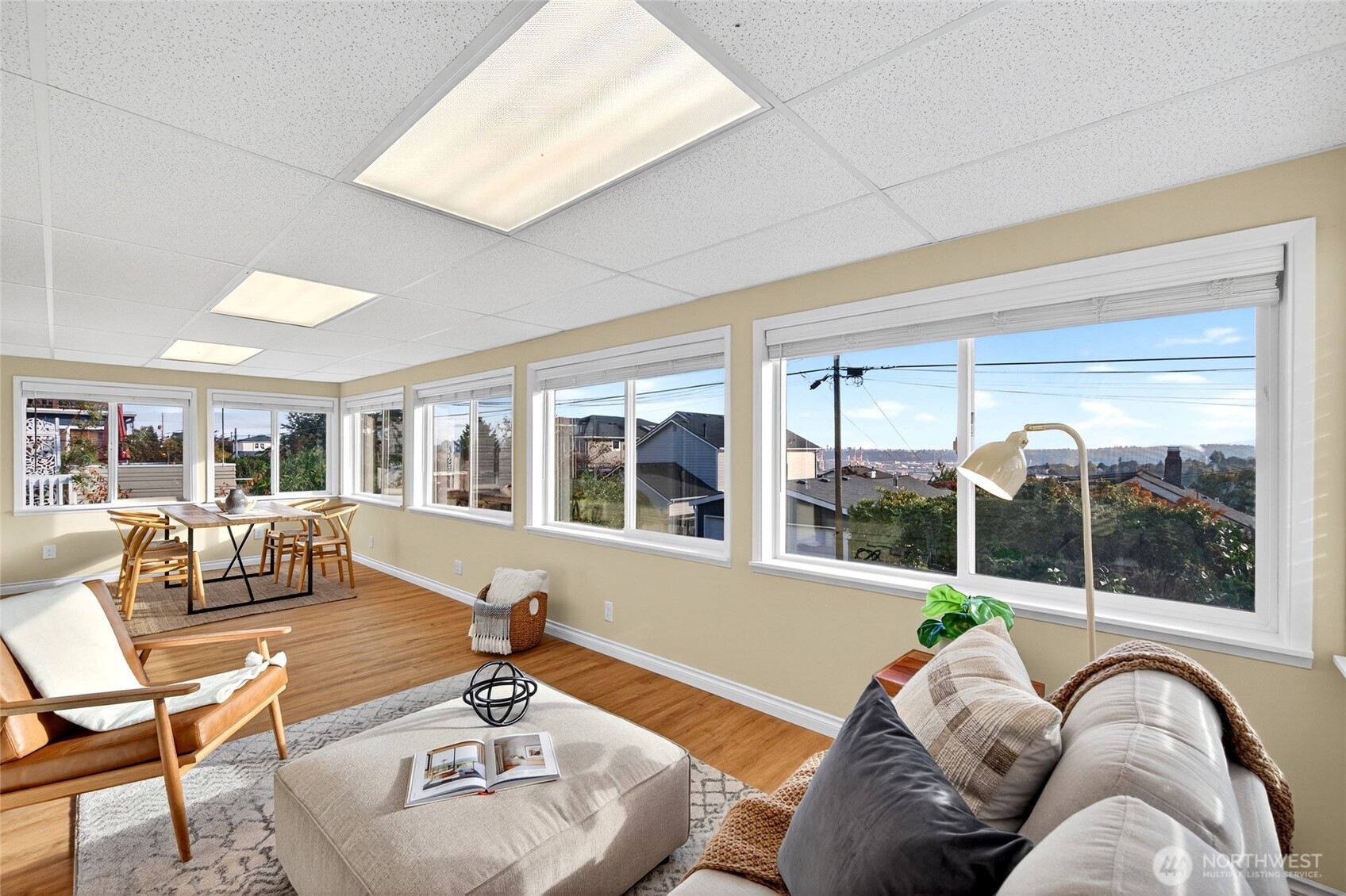 3846 35th Avenue Southwest Seattle, WA 98126 - Photo 18 of 40 a living room with furniture and large windows