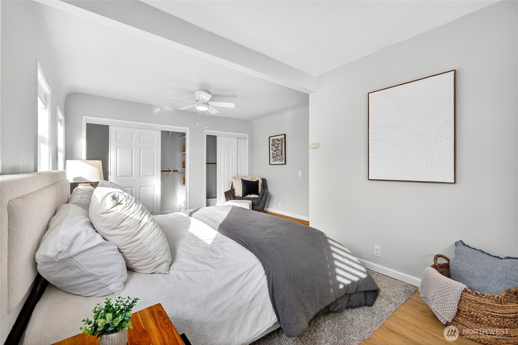 3846 35th Avenue Southwest Seattle, WA 98126 - Photo 23 of 40 a bedroom with a bed and wooden floor